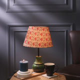 Green Sphere Shaped Lamp With Beige Floral Shade