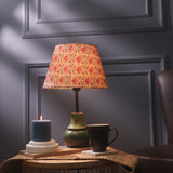 Green Sphere Shaped Lamp With Beige Floral Shade