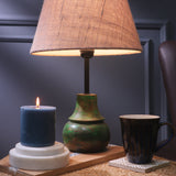 Green Sphere Shaped Lamp With Beige Shade